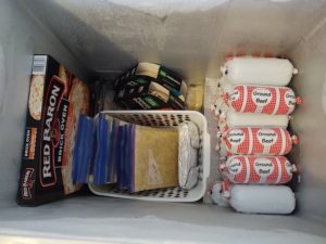 frozen pizza, frozen corn, and frozen ground beef